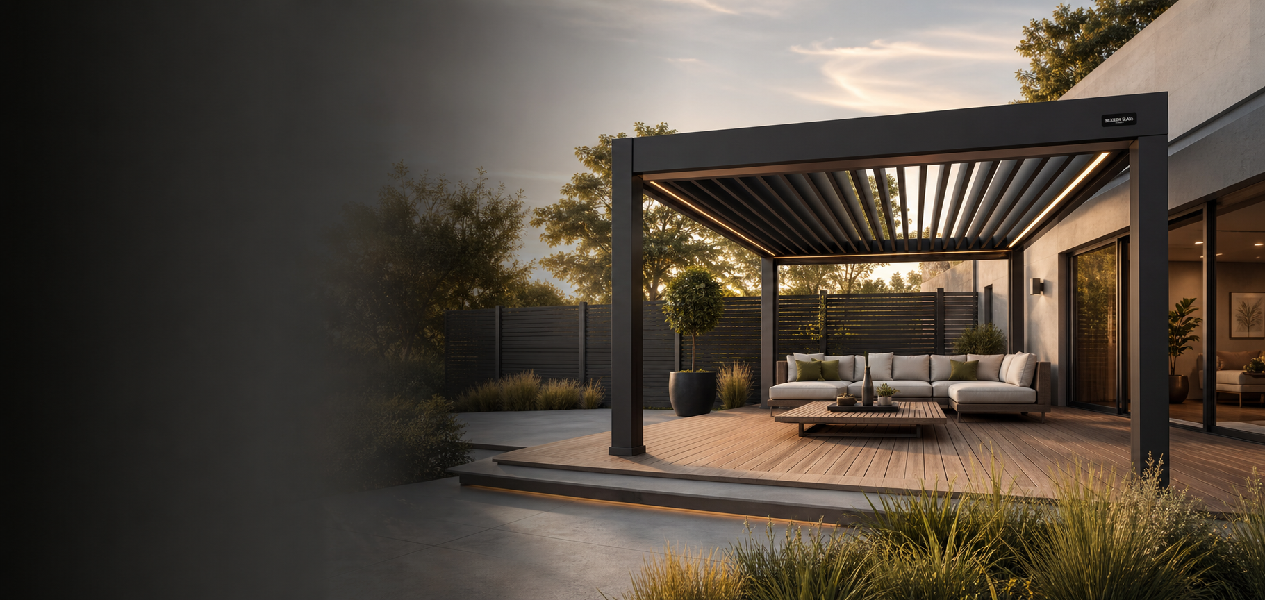 Nowoczesna grafitowa pergola bioklimatyczna z oświetleniem LED, ogrodzeniem panelowym i dyskretnym logo Modern Glass